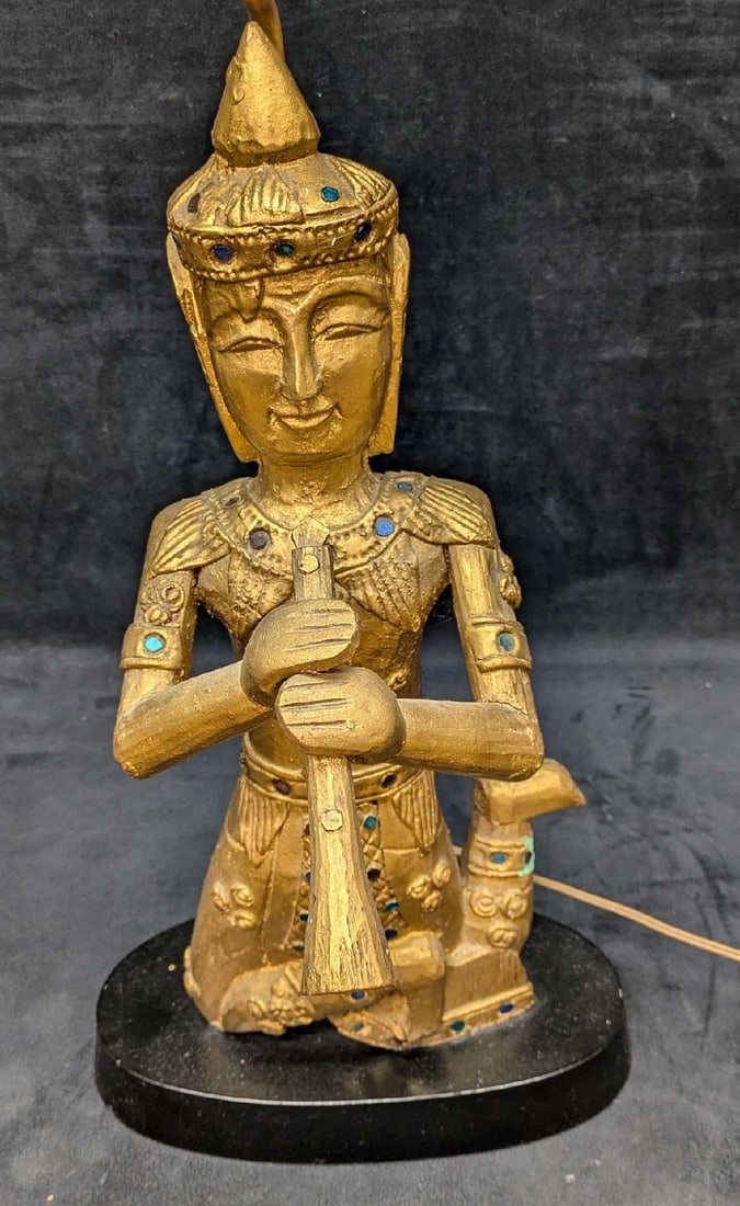 Vintage Thai Or Burmese Carved Gilt Wood Converted Lamp Flute Player: Vintage Thai Or Burmese Carved Gilt Wood Converted Lamp Flute Player. Untested. This is 11" x 11" x 31 3/4" (the harp cannot be removed) and it weighs 3lbs. There are cracks on the arms and the face.