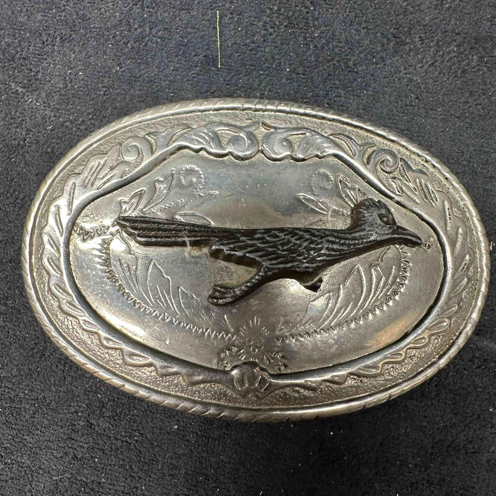 1985 GAP Great American Belt Buckle with Cripple Creek Leather Belt and Extra Buckle: Western belt featuring a 1985 Great American Products (GAP) cast metal buckle depicting two soaring eagles in flight against a mountain backdrop. The buckle is marked 1985 GAP on the reverse along wit