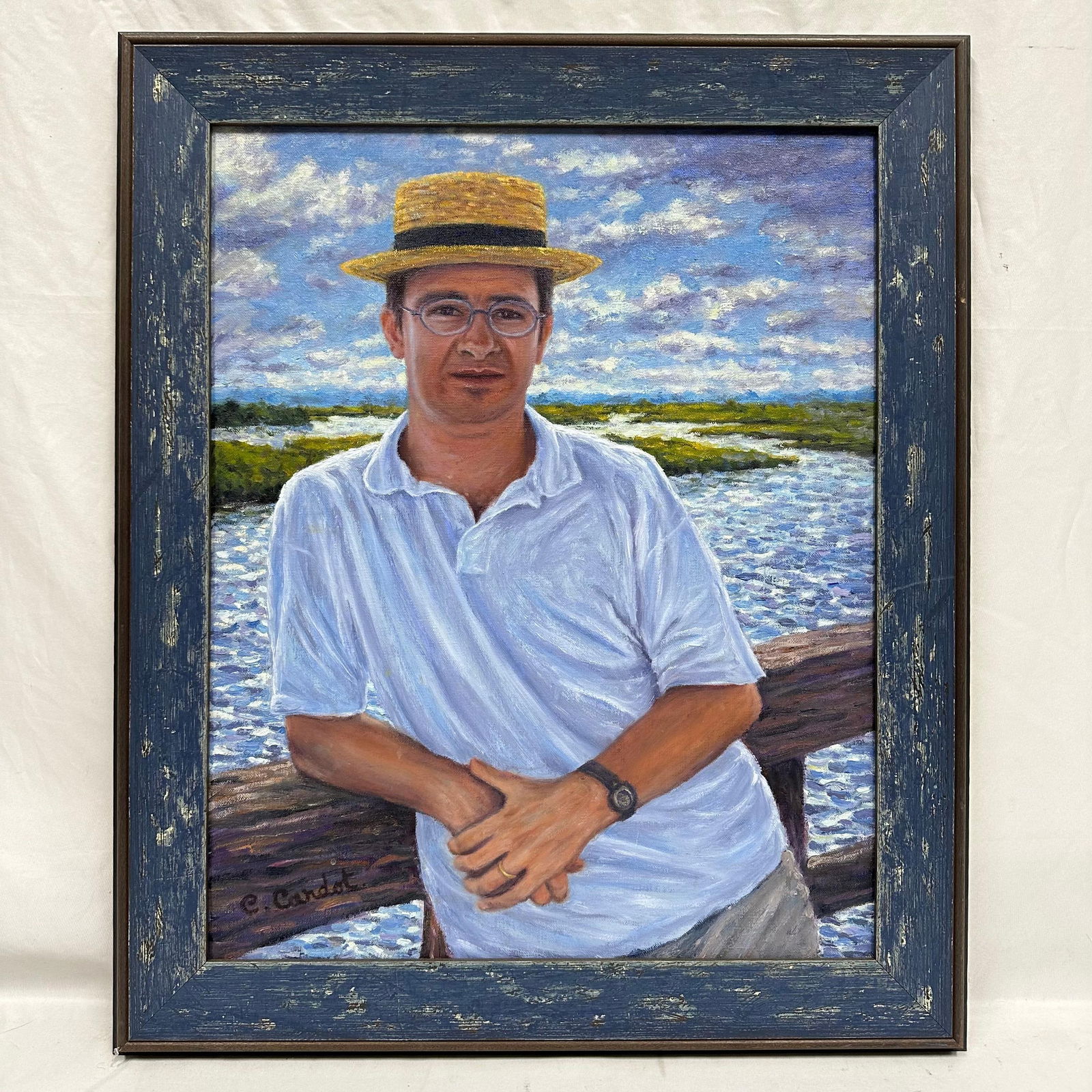 Christophe Cardot Oil on Linen Self Portrait Painting Signed and Inscribed to Michel Roux: Oil on linen self-portrait by French artist Christophe Cardot. Depicts a man in a straw hat and white shirt standing at a waterfront railing under a bright sky. Signed C. Cardot lower left and signed