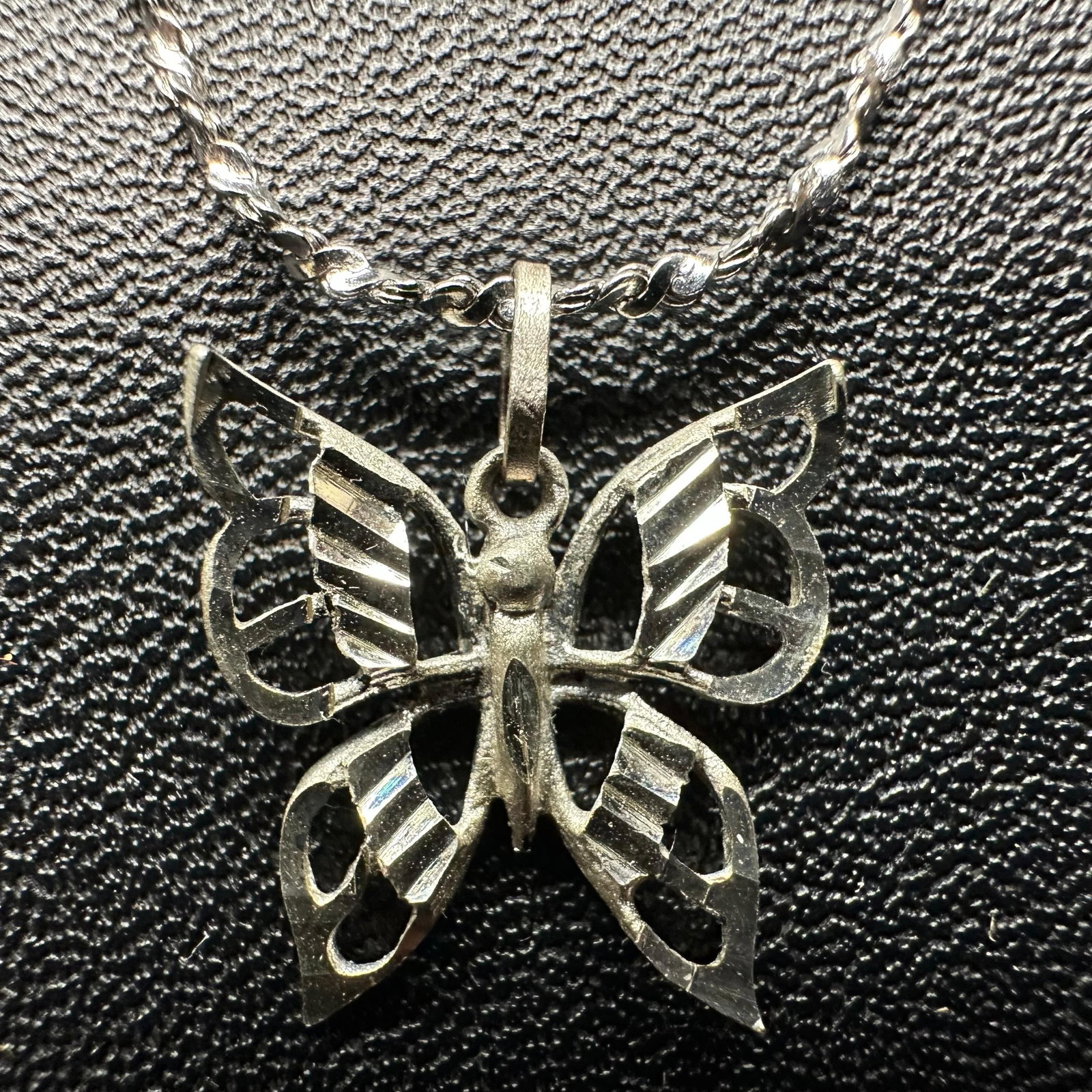 Sterling Silver Butterfly Pendant Woven Rope Chain Necklace: This item is in good pre-owned, previously used/displayed condition with noticeable light wear and surface scratches. Please reference all photos for full details. This piece of jewelry has been teste