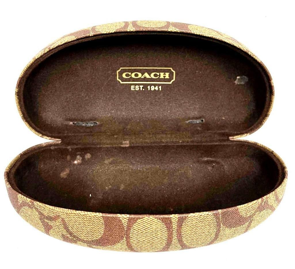 Vintage Coach Sunglasses Case: Vintage Coach Sunglasses Case. This lot contains a Vintage Coach Sunglasses Case. It is approx 6" x 2 1/2" x 3" and it weighs about 0.3lbs. Overall the sunglasses case is in good used condition w