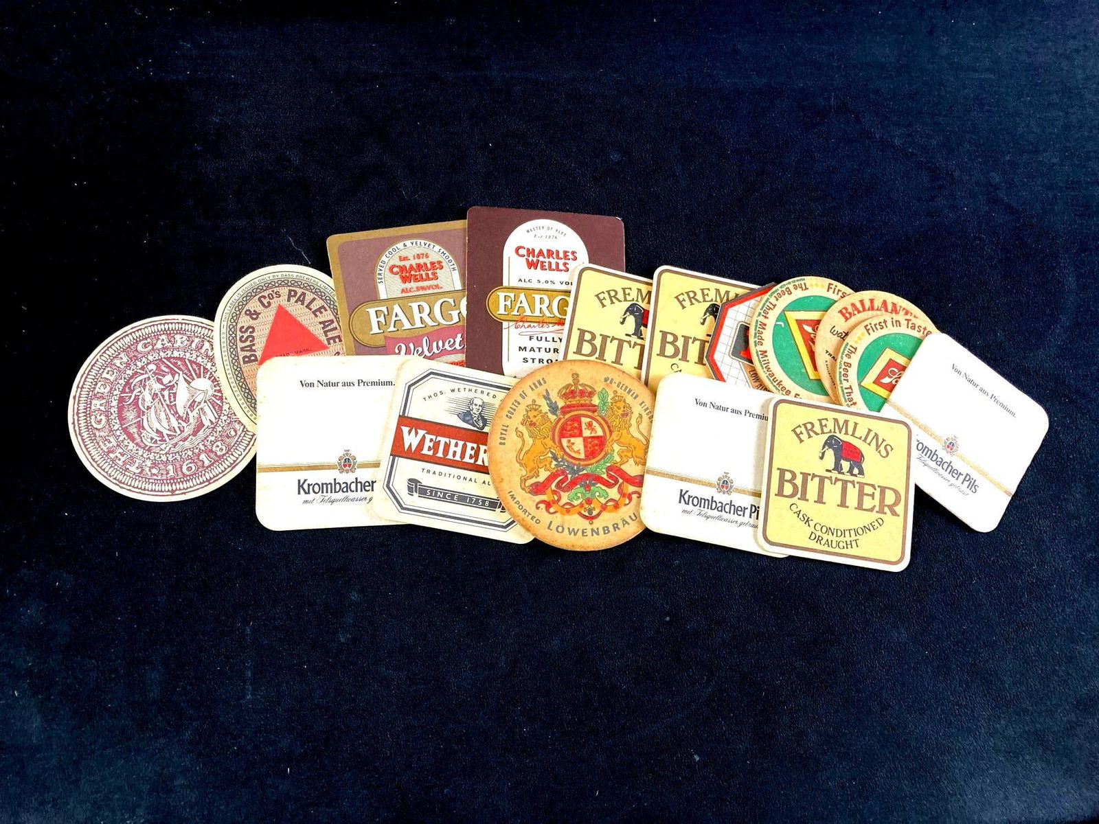 Set of (16) Beer Coasters: This lot includes: (1) Beer Coasters Bass & Co., Fremelin's Bitter, Krombacher Pils, The Green Cabin Room, and many others. Condition is used and see photographs for addit