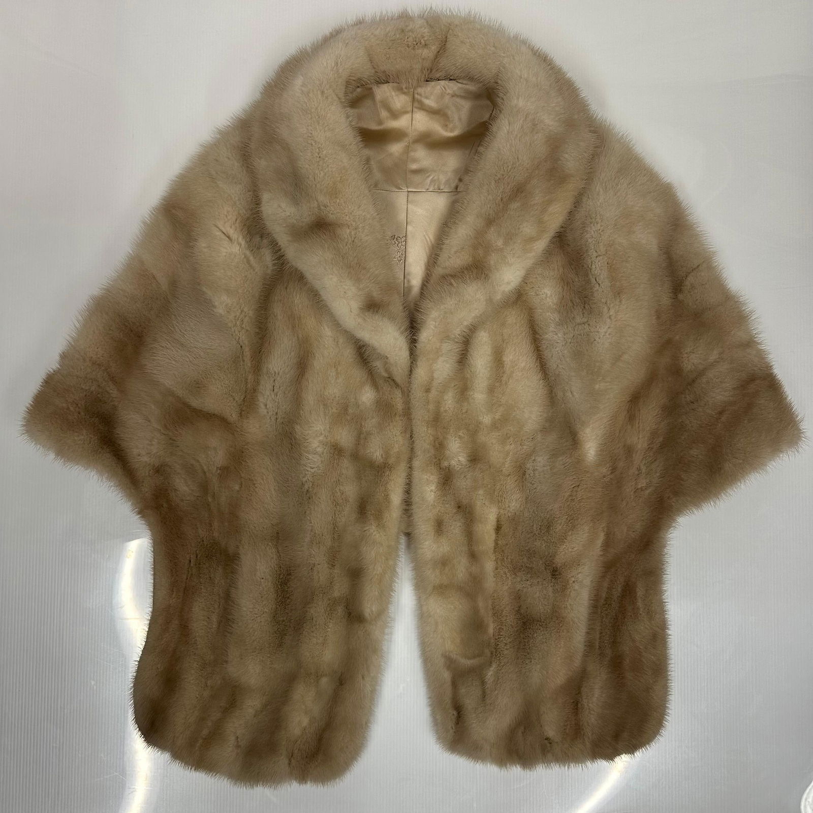 Vintage Mink Fur Stole Short Cape with Silk Lining: Vintage mink fur stole or short cape featuring a soft light-brown natural fur with a wide collar and open front. The interior is lined in a beige silk fabric with subtle embroidered detailing. No visi