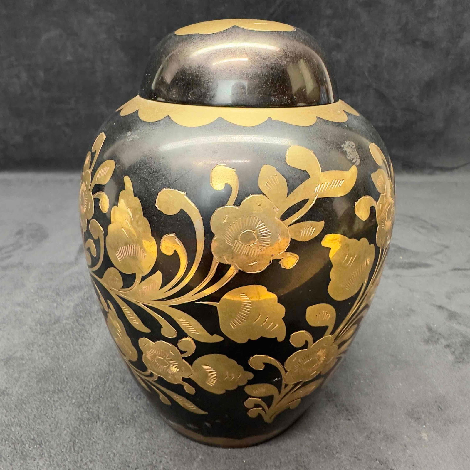 Terrybear Inc. Made In India Black Gold Gilt Floral Brass Vase Urn Flower: Terrybear Inc. Made In India Black Gold Gilt Floral Brass Vase Urn Flower. Comes with lid. Light wear and markings on the urn. This item is in pre-owned, previously displayed condition with light