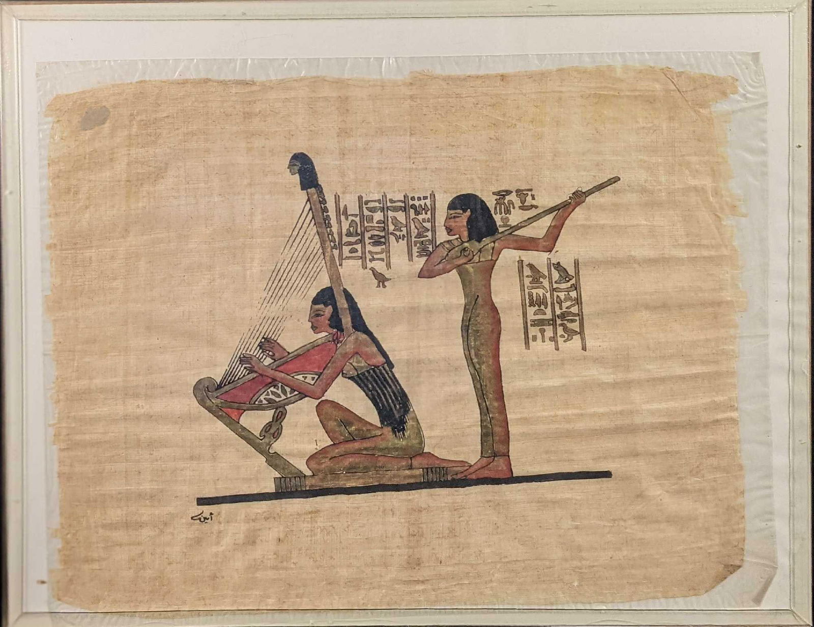Hand Painted Egyptian Papyrus Art Two Musicians: Hand Painted And Hand Signed Egyptian Papyrus Art. This shows female musicians playing a harp and lute. This was placed in a protective acyclic case that can be also hung on a wall, which is