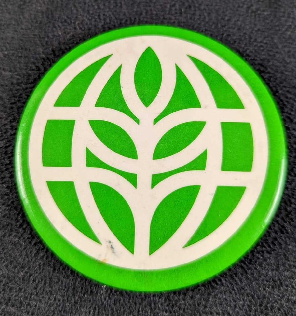 Vintage Disney EPCOT The Land Symbol 2 1/2" Button: Vintage Disney EPCOT The Land Symbol 2 1/2" Button. From the early 1980s. Is approx 2 1/2" x 2 1/2" and it weighs 0.02lb. The button has some markings from age and storage. Please see the images as