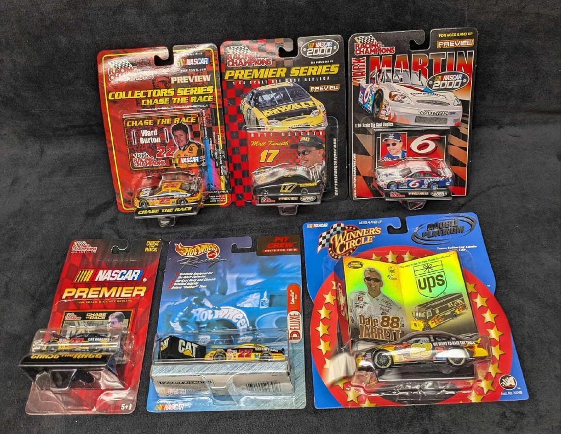 6 Racing Champions Hot Wheels Winner's Circle Die Cast Cars: 6 Racing Champions Hot Wheels Winner's Circle Die Cast Cars. This lot includes: (1) Racing Champions NASCAR Premier Ward Burton Die Cast Car. This comes in the original package that is approx 4 1