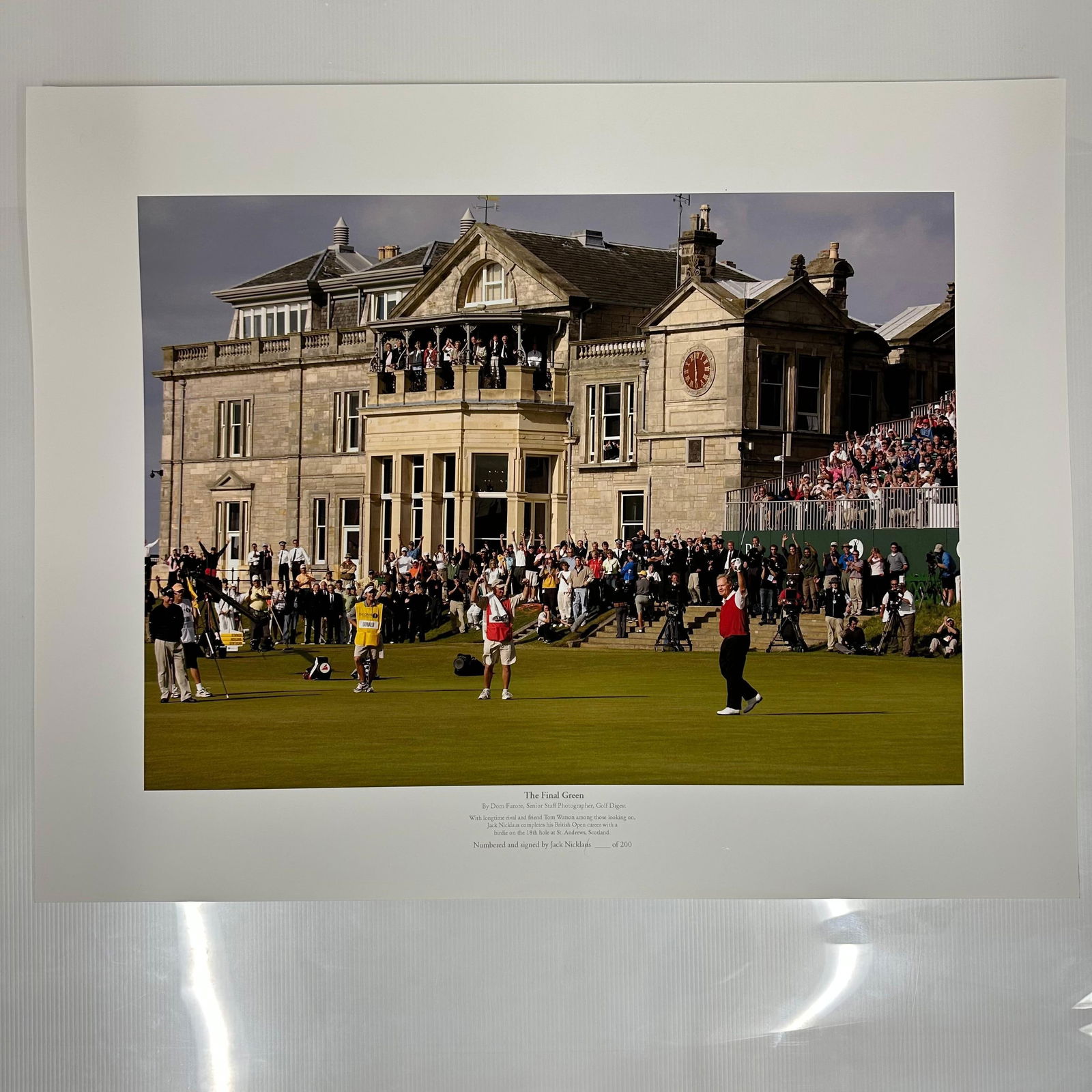 Jack Nicklaus The Final Green Golf Photography Print St. Andrews 18th Hole By Dom Furore Golf Digest: Large color photography print of The Final Green by Dom Furore, senior staff photographer for Golf Digest. The image shows Jack Nicklaus completing his British Open career with a birdie on the 18th ho