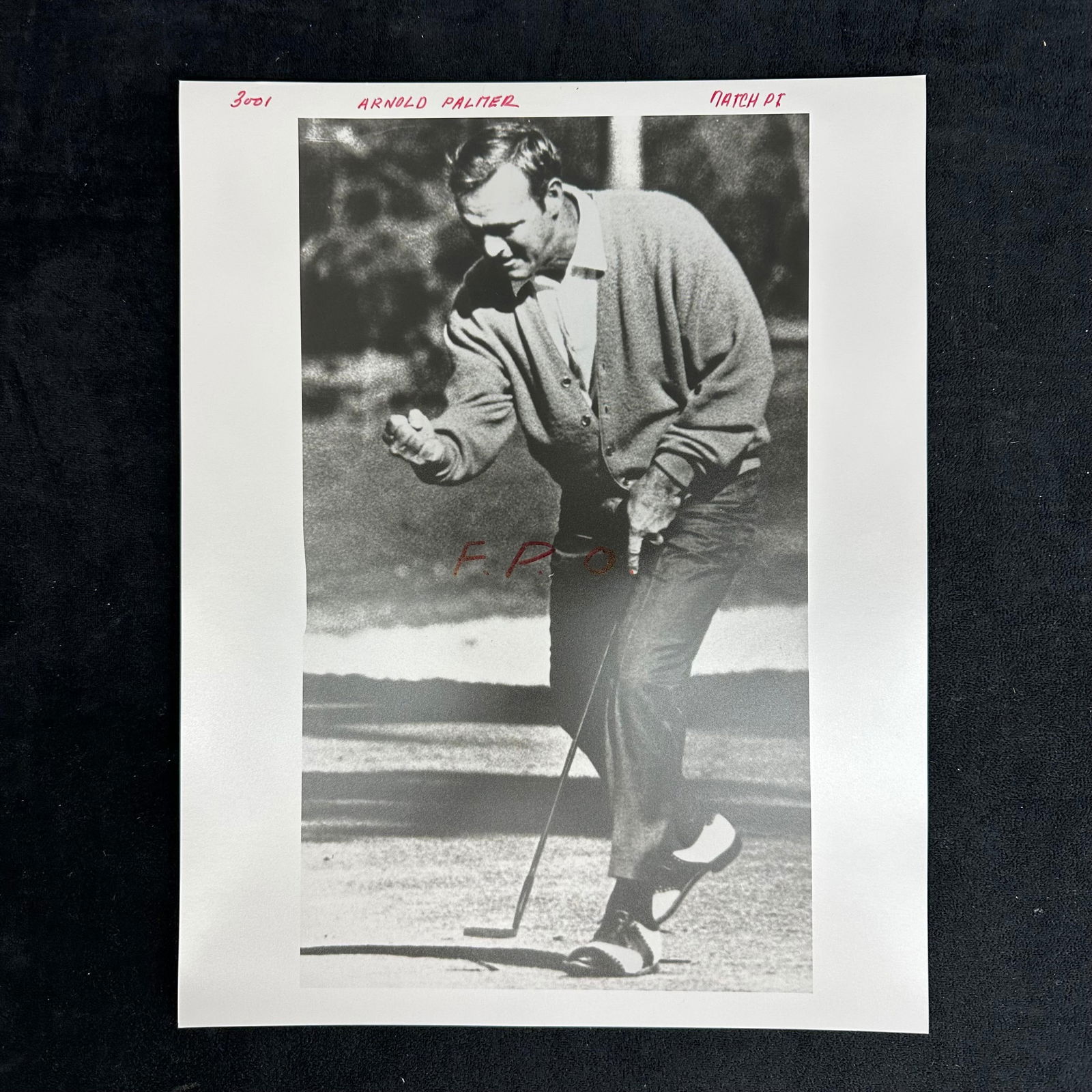Arnold Palmer Classic Golf Pose Black and White Analog Photograph Print on Pearl RC Paper: Black and white analog photograph print of legendary golfer Arnold Palmer, captured mid-putt in his signature focused stance. Marked in red ink “F.P.O.” and “Arnold Palmer” across the