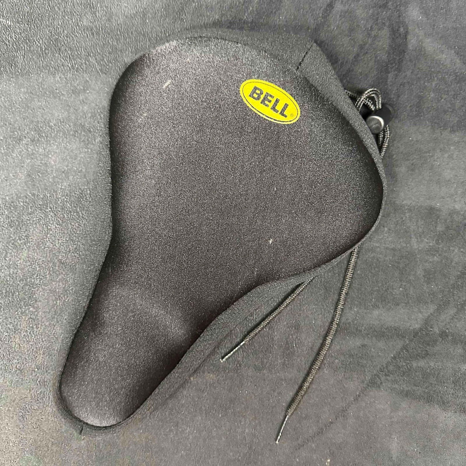 Bell Gel Black Bicycle Saddle Seat Pad Cover: This item is in good pre-owned previously displayed condition, with light wear, minor staining, and some surface white marks. Please reference all photos for full details. Seat Pad: 7 1/2" x 11&#