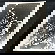 Analog Black and White Basketball Photo Print Kareem Abdul-Jabbar vs. Patrick Ewing Skyhook Shot: Vintage black and white analog photo print capturing Kareem Abdul-Jabbar (#33, Los Angeles Lakers) performing his iconic skyhook shot against New York Knicks Patrick Ewing #33. Printed on pearl