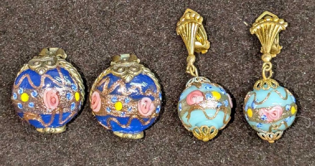 2 Sets Of Murano Venetian Art Glass Lamp Work Earrings A2: 2 Sets Of Murano Venetian Art Glass Lamp Work Earrings A1. Two sets of clip on earrings with hand painted designs on each and brass clip ons. The round earrings are approx 3/4" x 1/2" x 3/4" and the o