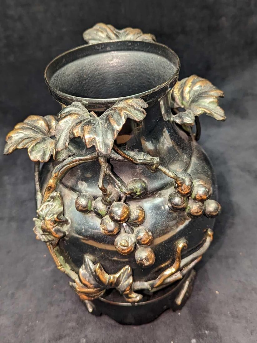 Vintage Game Room Ornamental Metal Vase: Vintage Game Room Ornamental Metal Vase. Appears to have been silver-plated. This is approx 8" x 7" x 10" and it weighs 4.55 lbs. The vase has some scratches and tarnish on the grapes. Please see the