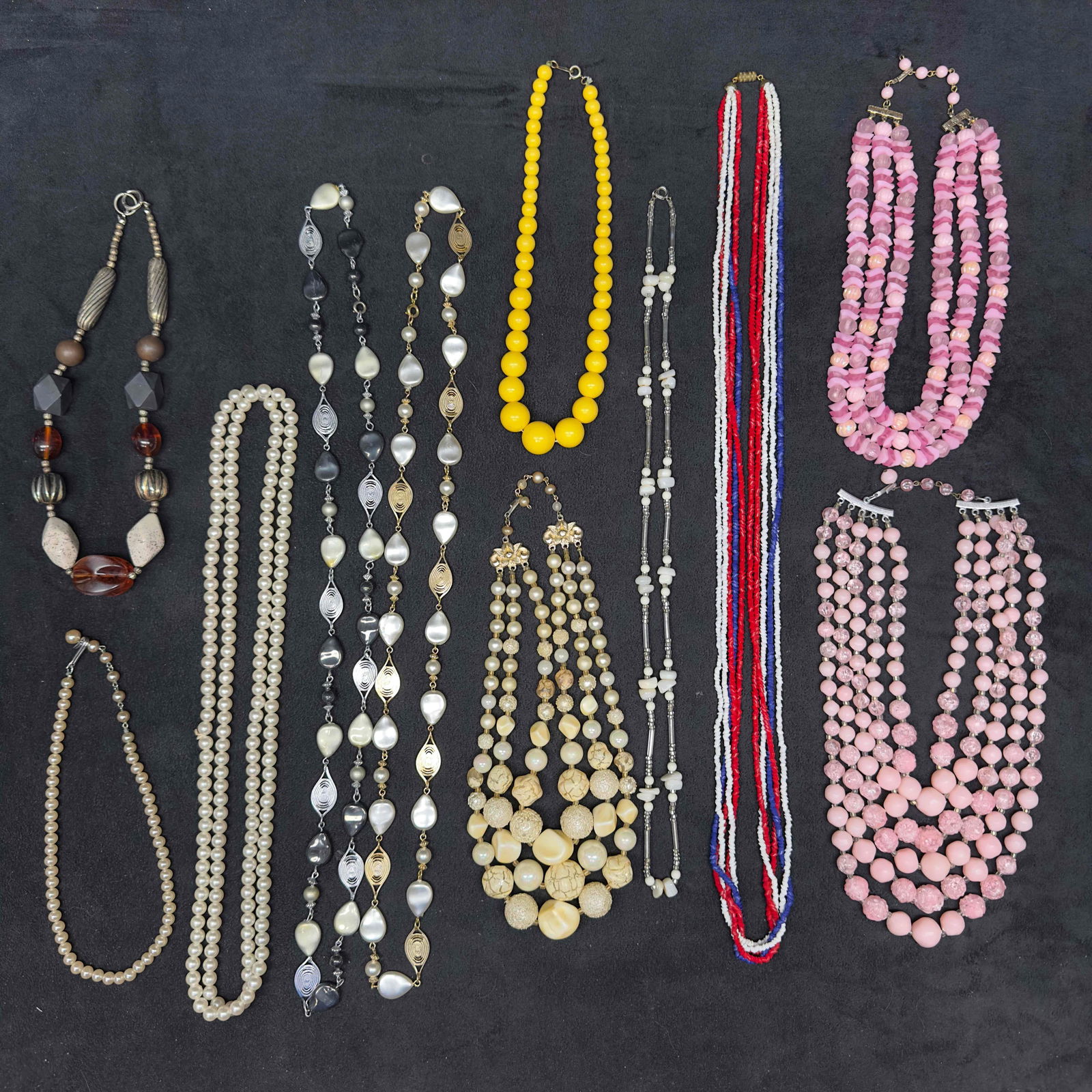 Costume Jewelry Necklace Set Various Necklaces Faux Pearl Plastic Beaded Accents: Costume Jewelry Necklace Set Various Necklaces Faux Pearl Plastic Beaded Accents. Eleven necklaces included in this set, with some made of plastic beads and faux pearl accents. These items are in good