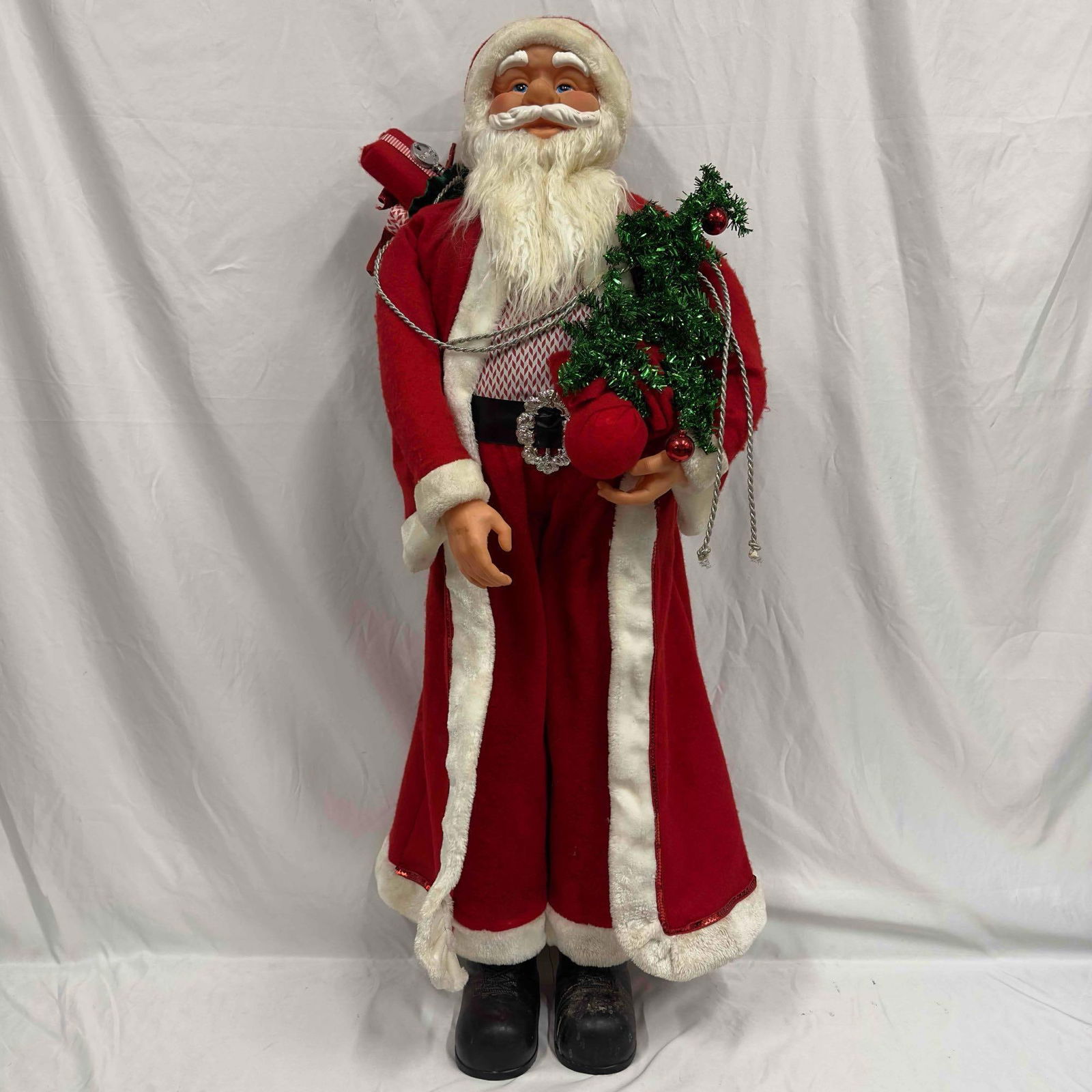 49" Tall Santa Holiday Christmas Decor Decorative Decoration: 49" Tall Santa Holiday Christmas Decor Decorative Decoration. This Snowman decor features Christmas accents, a tree, and some presents. Light wear is noticed, stains on Santa's shoes. This ite