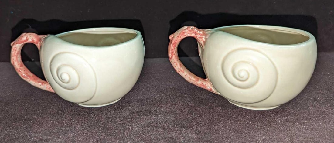 2 Vintage Retired Fitz & Floyd Oceana Flat Cups D K57: 2 Vintage Retired Fitz & Floyd Oceana Flat Cups D K57. This retired series was originally released in 1977. Each cup is approximately 5" x 4" x 2 1/2" and the total weight is 0.58lb. The cups have no 
