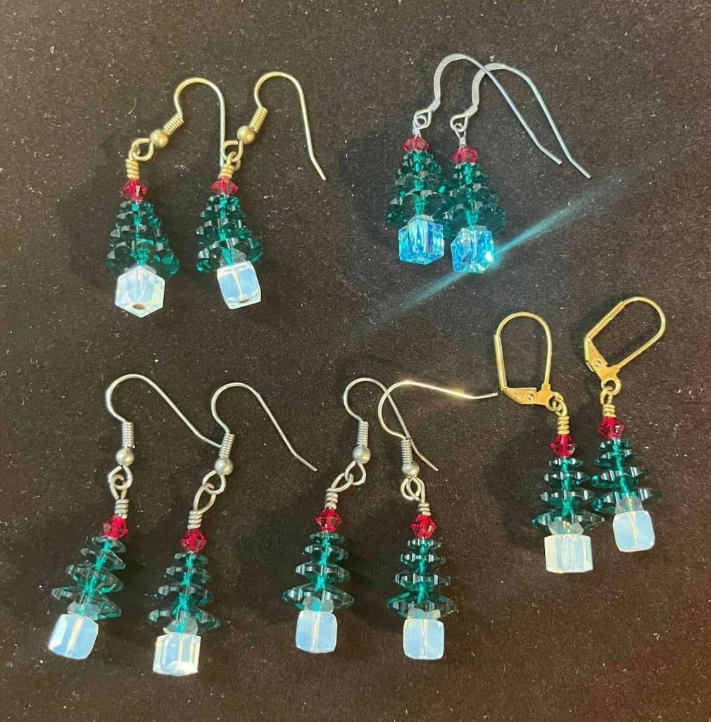 Fie Pairs Of Beaded Christmas Tree Earrings: This lot contains Five Pairs Of Beaded Christmas Tree Earrings. The Jewelry is one size fits all. Bundle fits together in a small 2 3/4" x 2 1/4" plastic bag. Total weight is approx 1oz. Overall the