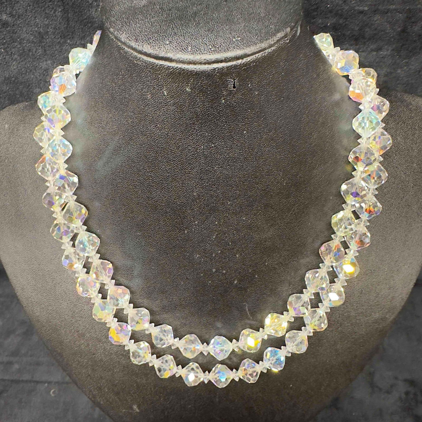 Vendome Clear Glass Crystal Aurora Borealis Beaded Black Bead Clasp Double Strand Necklace H58: Vendome Clear Crystal Beaded Aurora Borealis Black Bead Clasp Accent Double Strand Necklace H58. Necklace with clear glass beads with beautiful designs. The necklace features a open box clasp closure
