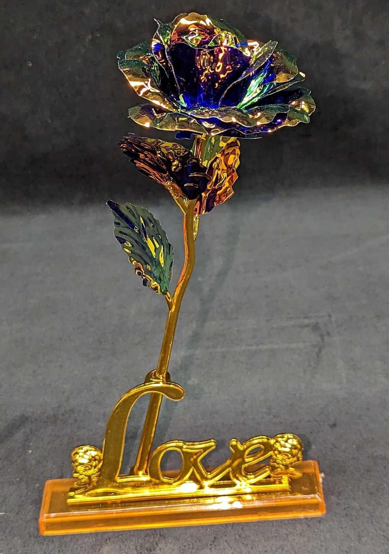 Childom Love Forever Rose, Purple And Gold B: Childom Love Forever Rose, Purple And Gold B. Plastic flower with stand. This is approx 5 1/2" x 1 1/4" x 9 3/4". Comes with its original box which is approx 3 3/4" x 3" x 10 1/4" and it weighs 0.51lb
