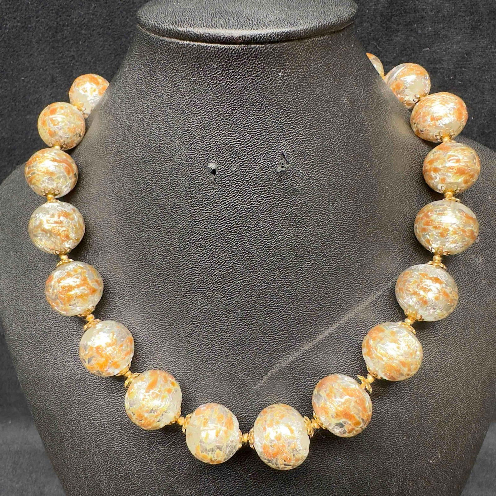 Venetian Murano Art Glass Lamp Work Silver Colored Beaded Copper Accent Necklace C91: Venetian Murano Art Glass Lamp Work Silver Colored Beaded Copper Accent Necklace C91. Necklace with silver colored glass beads with beautiful designs on each. The necklace features copper accents. The