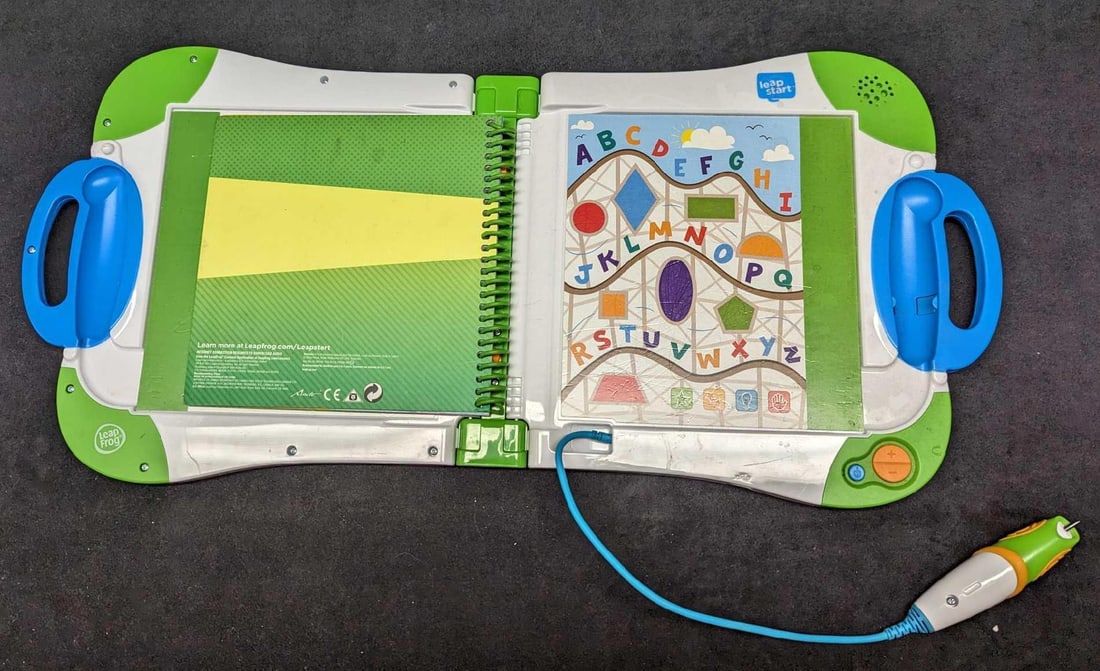 Leap Start Interactive Leap Frog: Leap Start Interactive Leap Frog. Comes with a "Let's Play - Preschool To First Grade Sampler Book". Was tested and it works. The Leap Frog device is in a good, used condition with some markings and s