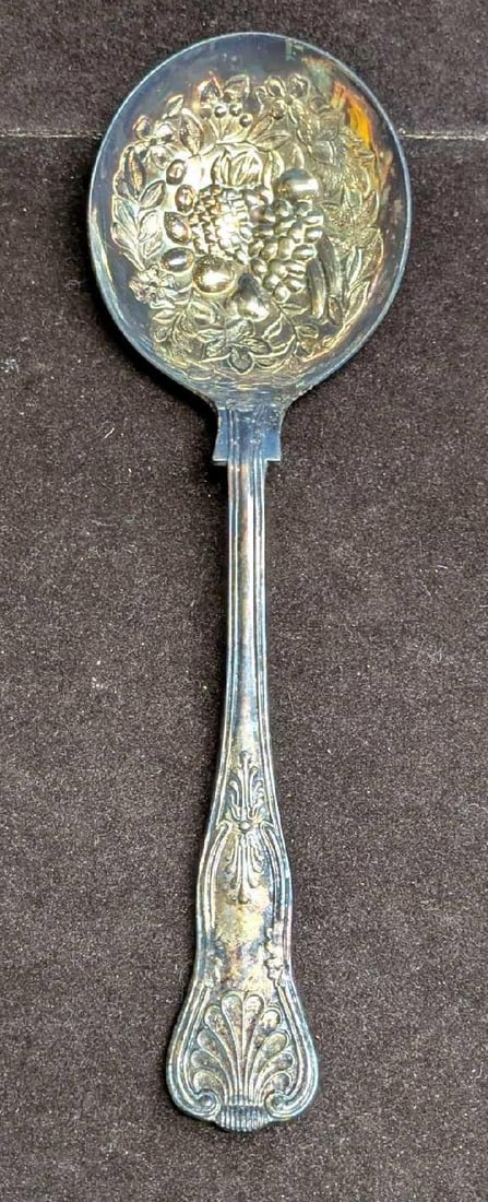 Vintage 9" Silverplated Flower Design Spoon: Vintage 9" Silverplated Flower Design Spoon. This is approx 2 3/4" x 9" x 1" and it weighs 0.25lb. The spoon has some surface tarnish.