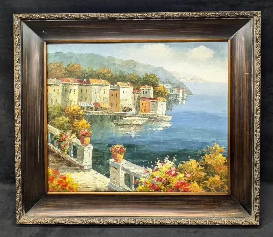 Framed Oil On Canvas Seaside Town: Framed Oil On Canvas Seaside Town. This is approx 30 1/2" x2" x 27" and it weighs 7lbs. There are some scratches and chips on the frame. The canvas is also a little on the loose side from the frame.