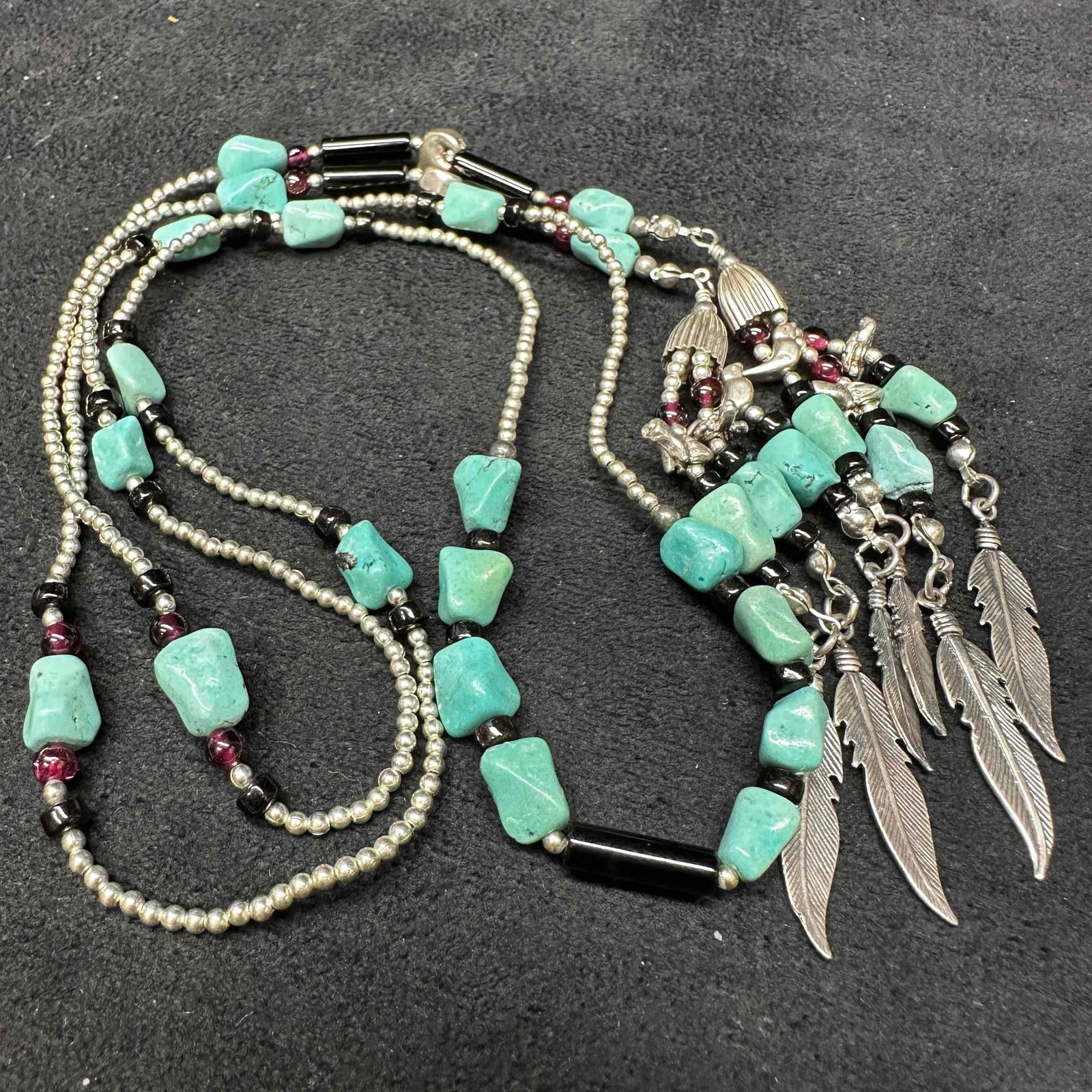Shube Dakota West 925 Open Wrap Turquoise Garnet Black Onyx 42" Long Necklace Feather Animals: This item is in good pre-owned, previously used/displayed condition with noticeable light wear, and surface scratches. Please reference all photos for full details. This piece of jewelry has been