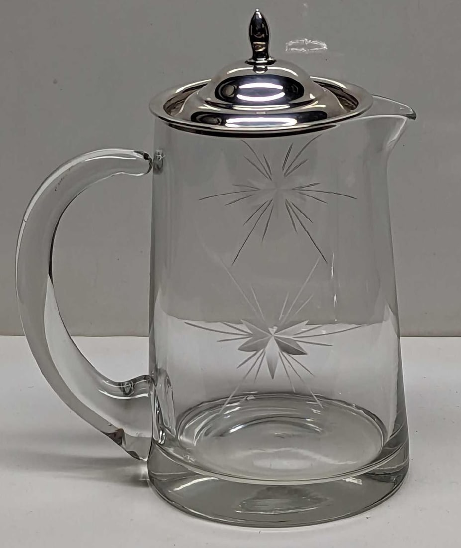Crystal Star Burst Cream Pitcher With Sterling Lid: Crystal Star Burst Cream Pitcher With Sterling Lid. This is approx 4" x 3" x 4 1/2" and it weighs 0.44lb.The creamer has some wear on the bottom.