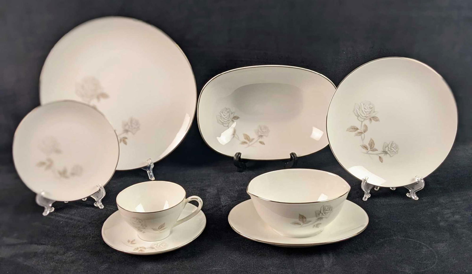 Vintage Rosay By Noritake White Roses Fine China Dinnerware Lot Of 37: Vintage Rosay By Noritake with an Gray/White Roses On White That Was Released From 1961 - 1976. This lot includes: (1) Oval Vegetable Bowl. This is approx 9 3/4 x 7" x 3" (1) Gravy Boat