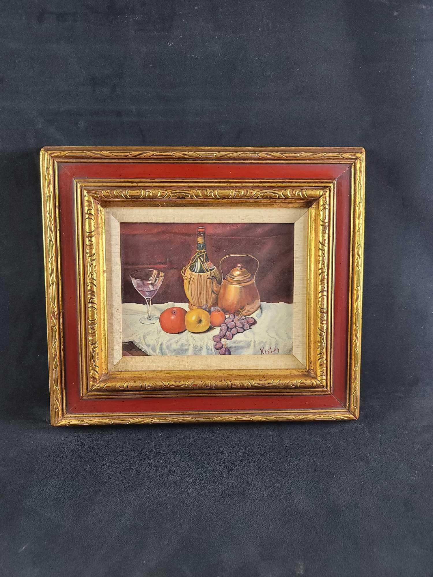 Keeley Original Still Life with Chianti JB: This beautiful painting is oil and the artist Ken Keeley titled it " Still Life With Chianti." Unknown date of the painting, however, it is set in a beautiful deep red with gold trim. It is