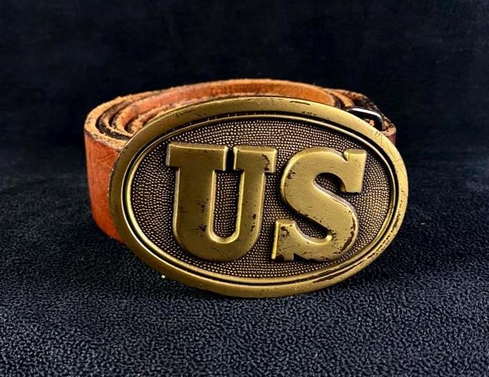 Replica Civil War US Army Belt: Replica Civil War US Army Belt Replica of belt and buckle worn by the Union Army during the Civil War. The brass colored metal buckle comes on a size 42 tan leather belt, and is removable. In