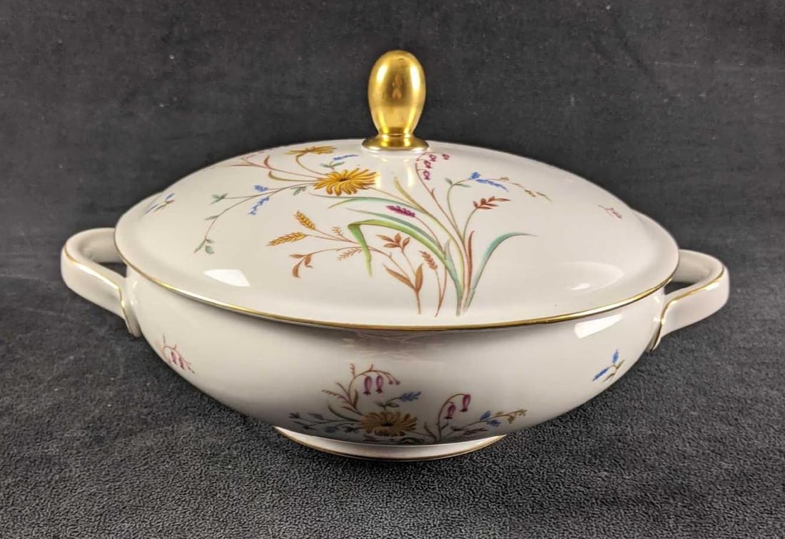 Eschenbach Round Covered Vegetable Dish: Eschenbach Round Covered Vegetable Dish This is a vintage Eschenbach Vegetable dish that was made ins Bavaria Germany. The dish is adorned with a wildflower design and gold-painted rim. This is in