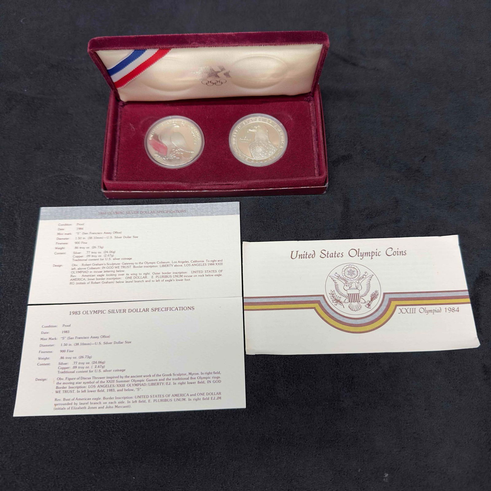 1984S United States Olympic Coin XXIII Olympiad Silver Dollar Proof: These coins have been tested and researched to the best of our ability prior to listing. Please reference all photos, as they are a part of the condition. DETAILS: Metal - SilverTested - YesSize -