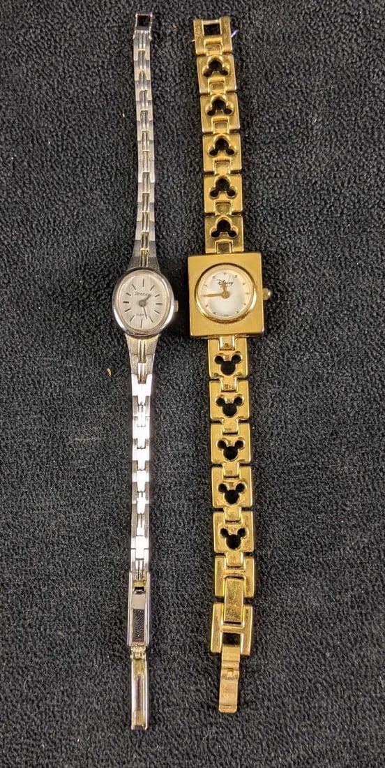 Women's Watches Gold and Silver Colored: Women's Watches Gold and Silver Colored These two watches are in good condition, they need new batteries but should work. *not tested* they do not seem to have any damage. These are really cute