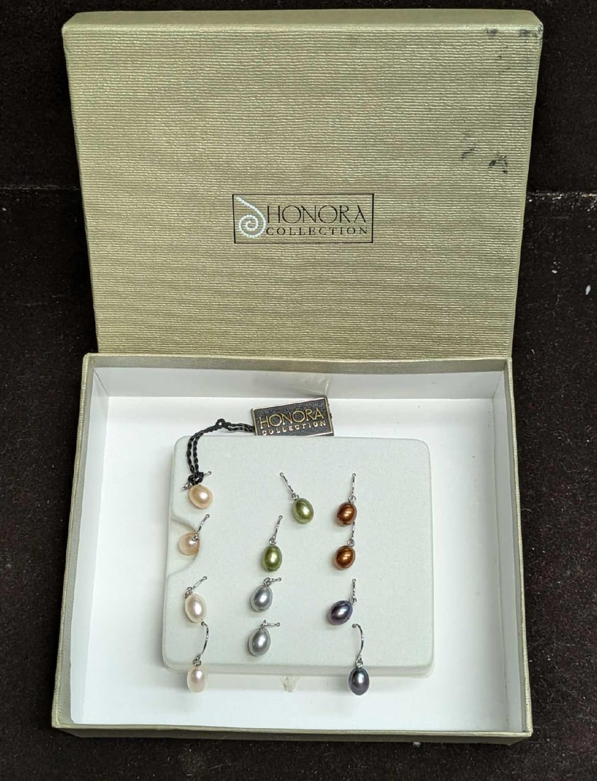 Six Honora Cultured Pearl Sterling Silver Earrings: Six Honora Cultured Pearl Sterling Silver Earrings. With sterling silver hooks. These come in the original box that is approx 5 1/4" x 4 1/2"x 1/2" and it weighs 0.13lb. 