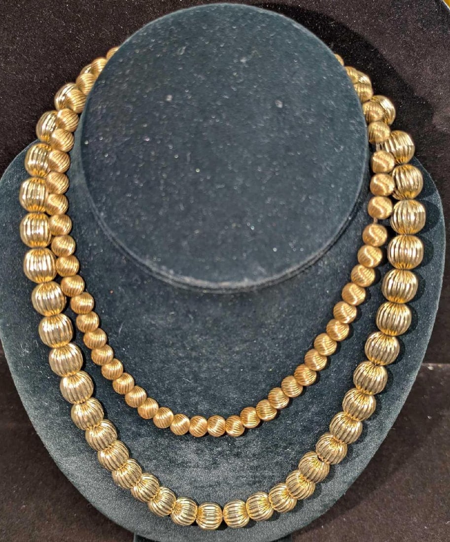 Two Vintage Gold Tone Textured Beaded Necklaces: Two Vintage Gold Tone Textured Beaded Necklaces. One is approx 19" and the other is 15". The total weight is 0.12lb. Neither have any artist or company markings.