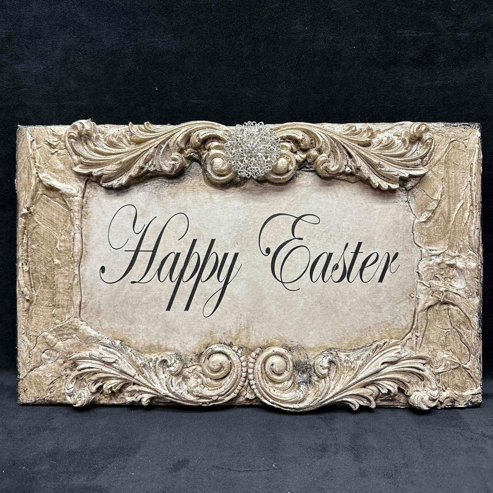 Michelle Butler Designs Happy Easter Plaque: Minor chips on resin wood decor. Plaque hand crafted art piece featuring rhinestone accents. Signed by artist Michelle Butler on the back. This item is in good pre-owned, previously displayed
