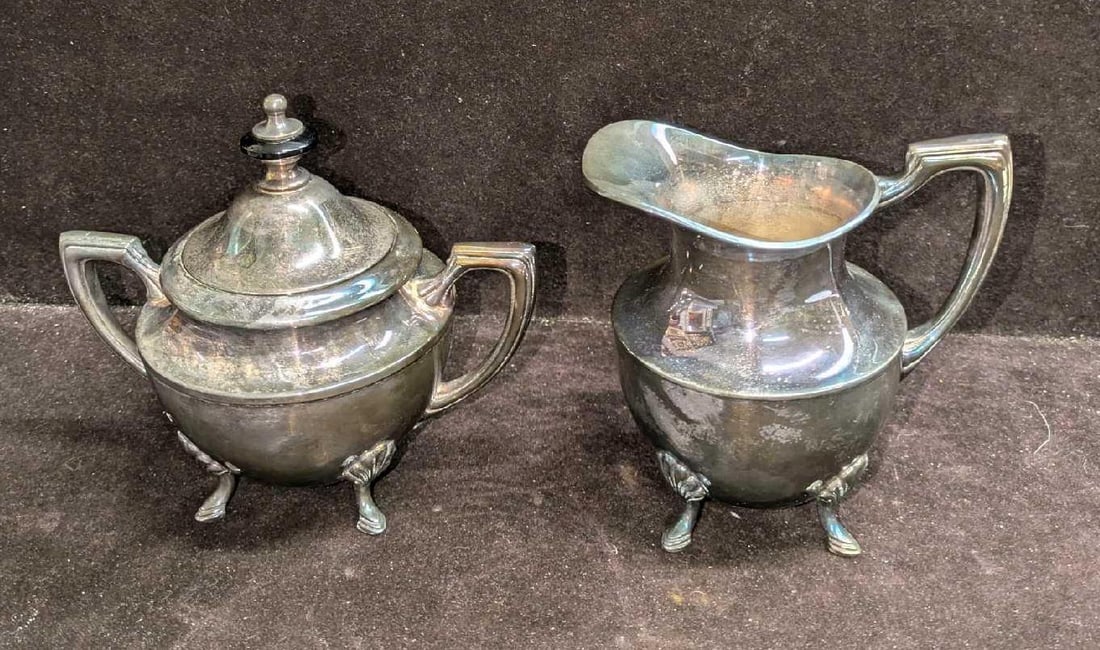 Vintage Crescent Silverplated Creamer And Sugar Bowl: Vintage Crescent Silverplated Creamer And Sugar Bowl. This lot includes: (1) Sugar Bowl. This is approx 6 1/2" x 4 1/4" x 6". (1) Creamer. This is approx 5" x 3 3/4" x 5 1/8".