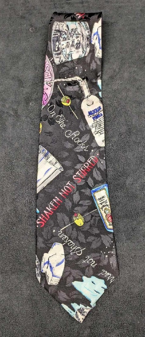 Absolut Vodka Nicole Miller Silk Tie Martini New B: Absolut Vodka Nicole Miller Silk Tie Martini New B. 100% silk tie designed by artist Nicole Miller, for Absolut Vodka in the 1990s. It does not appear to have been used. In the package, it is