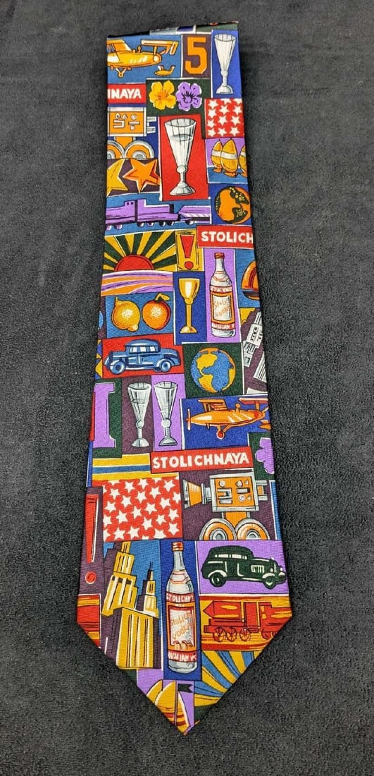 Stoli Vodka Fathulla And Hurshida Silk Tie New.: Stoli Vodka Fathulla And Hurshida Silk Tie New. This 100% silk tie is still in the original packaging and has never been used or worn. The package is approx 6" x 15 1/2" and it weighs 0.28lb. 