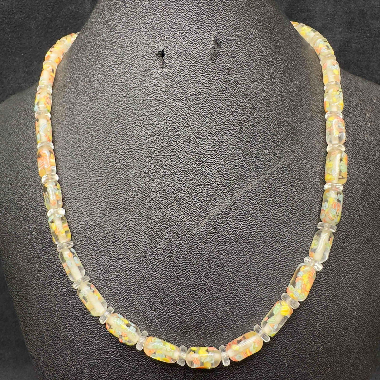Murano Venetian Lamp Work Art Glass Multi Colored Bead Clear Beaded Necklace F97: Murano Venetian Lamp Work Art Glass Multi Colored Bead Clear Beaded Necklace F97. Necklace with clear multi colored glass beads with beautiful designs on each. The necklace features a barrel clasp clo