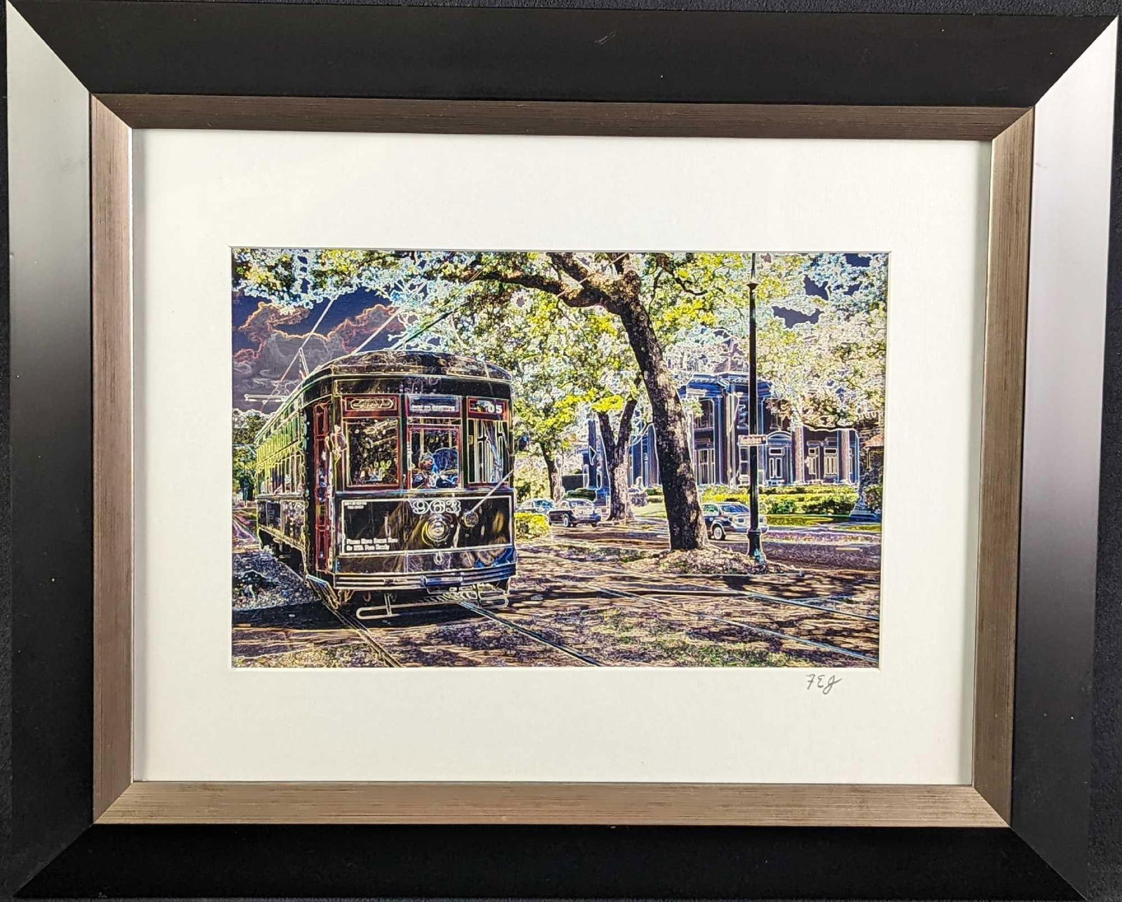 Framed Frank Juge Electric Streetcar Photo: Framed Frank Juge "Electric Streetcar" Photo. This altered digital photograph was signed by the artist on the bottom right of the matting. The framed photo is approx 17 1/4" x 1" x 14" and it weighs