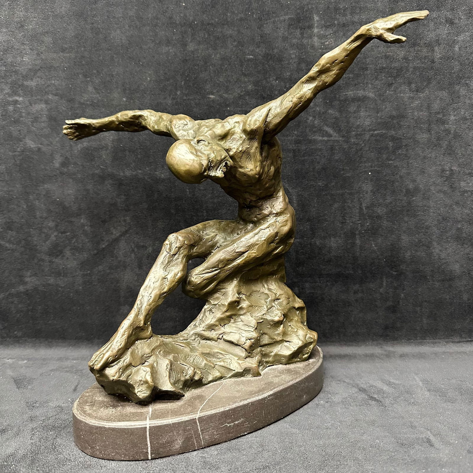 Signed Bronze Sculpture by Milo Abstract Nude Male Figure on Marble Base: Bronze Sculpture by Milo Surrealist Abstract Modern Art Yoga Male Statue Artwork. Signed bronze sculpture by artist Milo depicting a highly detailed nude male figure in a dynamic, abstract pose with a