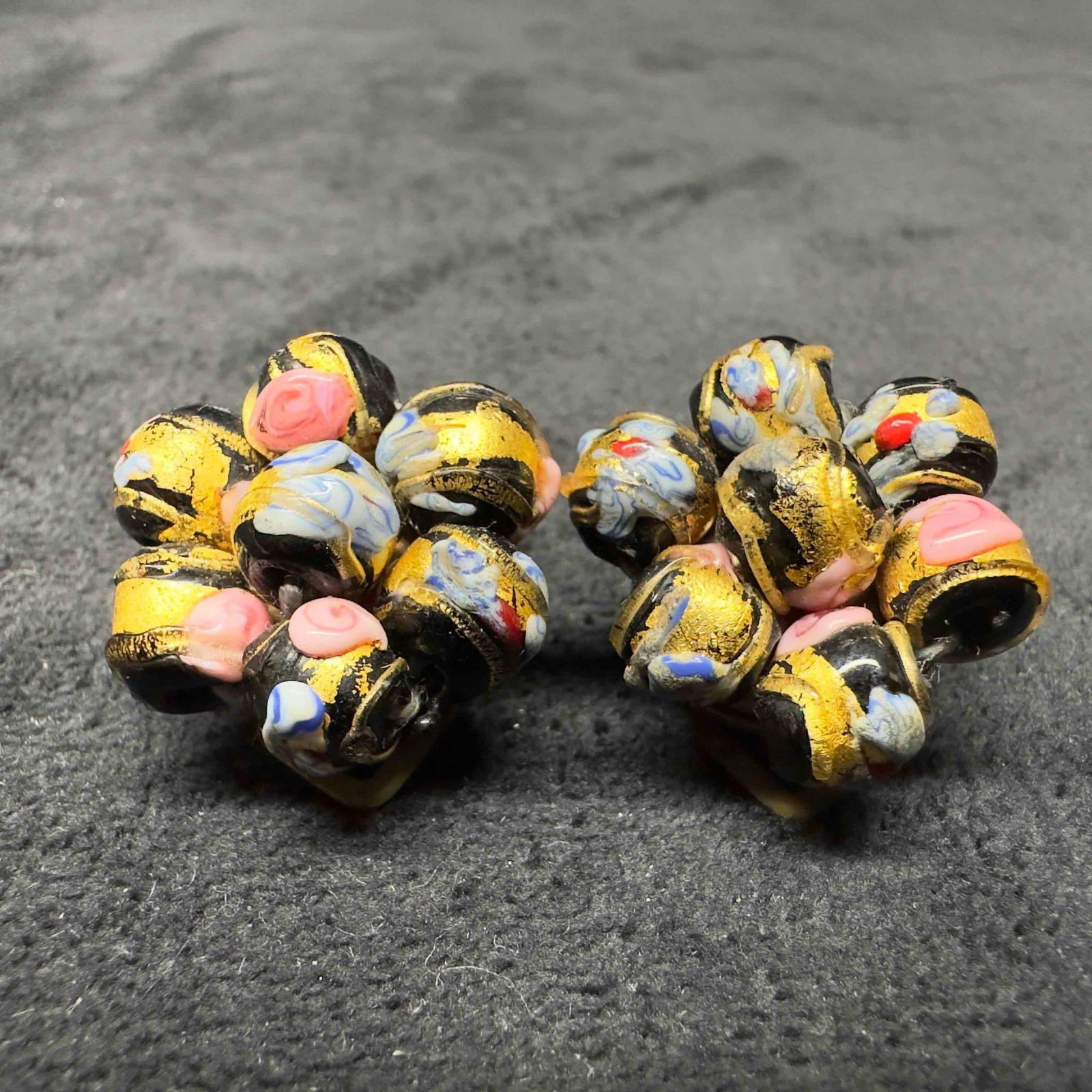 Murano Venetian Art Glass Lamp Work Black Floral Fiorato Beaded Earrings D40: Murano Venetian Art Glass Lamp Work Black Floral Fiorato Beaded Earrings D40. Earrings with black colored glass beads with beautiful hand painted designs on each. The earrings feature floral and gold