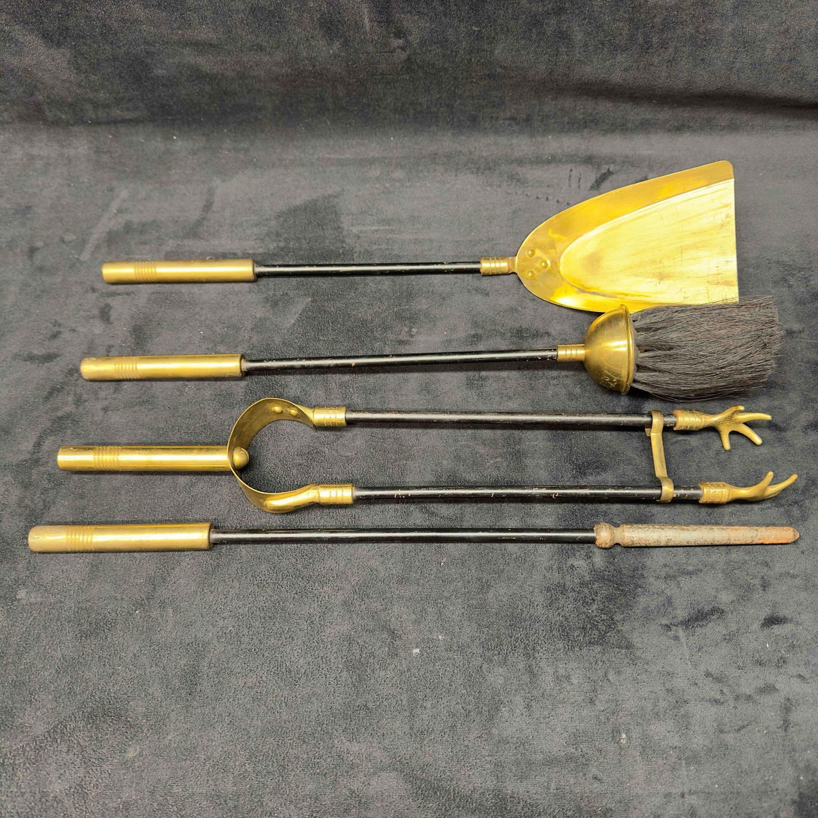 Brass Fireplace Tools Set of Four 4 Poker Shovel Broom Tong Black Gold: Brass Fireplace Tools Set of Four 4 Poker Shovel Broom Tong Black Gold. This set features black and gold colored brass fireplace tools. Each piece is solid heavy weight including a set of tongs, a pok