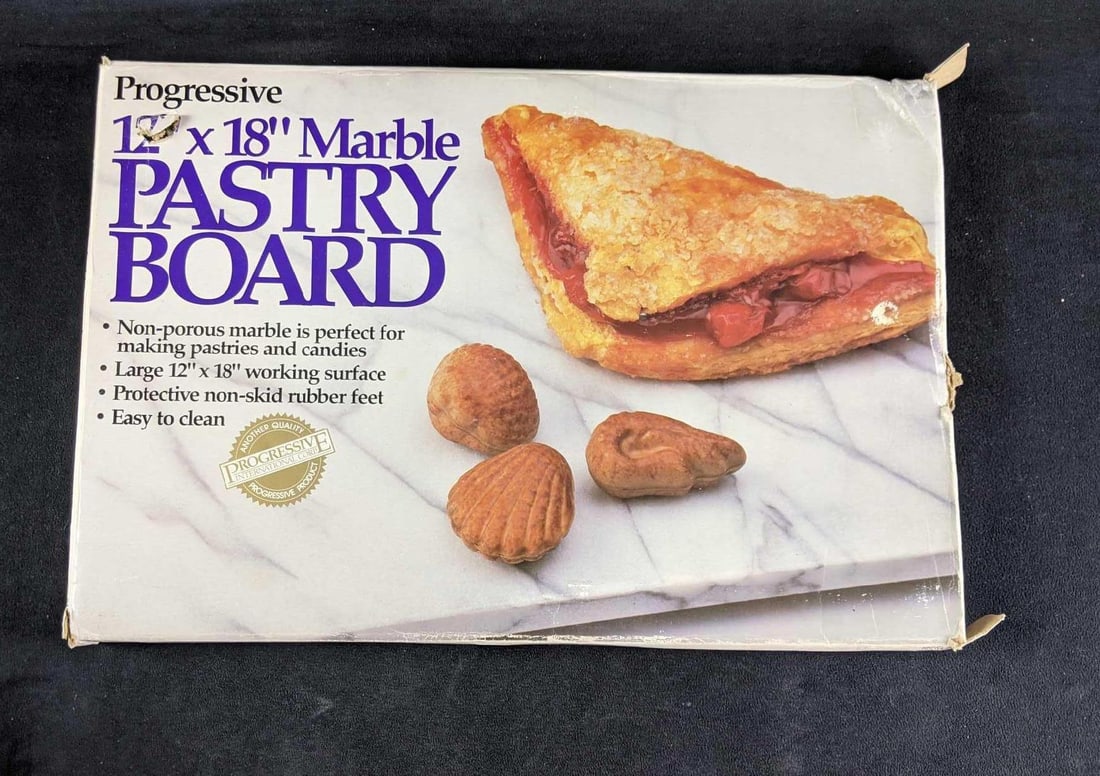 Marble Pastry Board 12"x18": Marble Pastry Board 12"x18" This is a white and gray marble pastry board that offers a large workspace to make your pastries. This is in good condition, it is lightly used with some