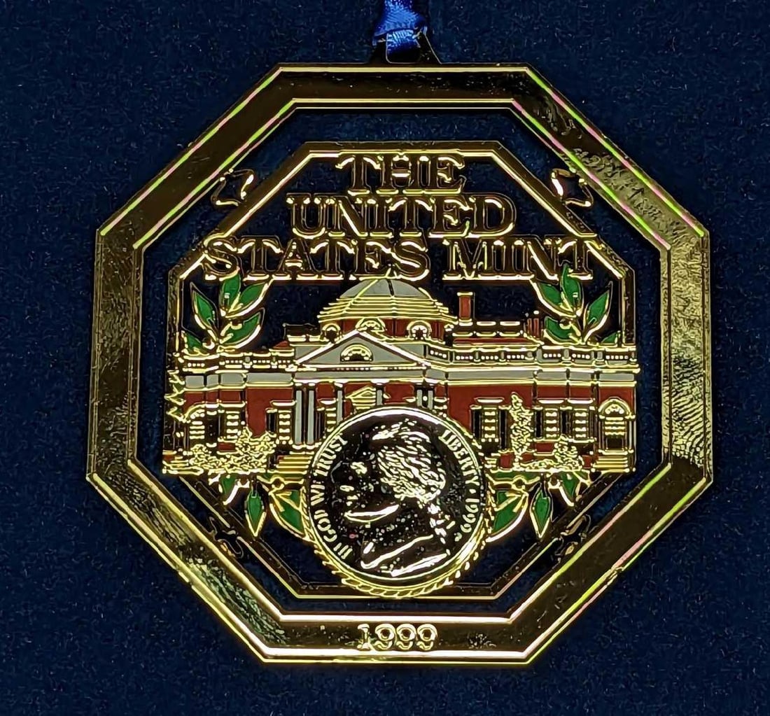1999 US Mint Holiday Ornament Jefferson Nickle: 1999 US Mint Holiday Ornament Jefferson Nickle. Has an uncirculated nickle as part of the ornament. The ornament is approx 2 7/8" x 3". It comes in its original package that is approx 6" x 5 1/4"