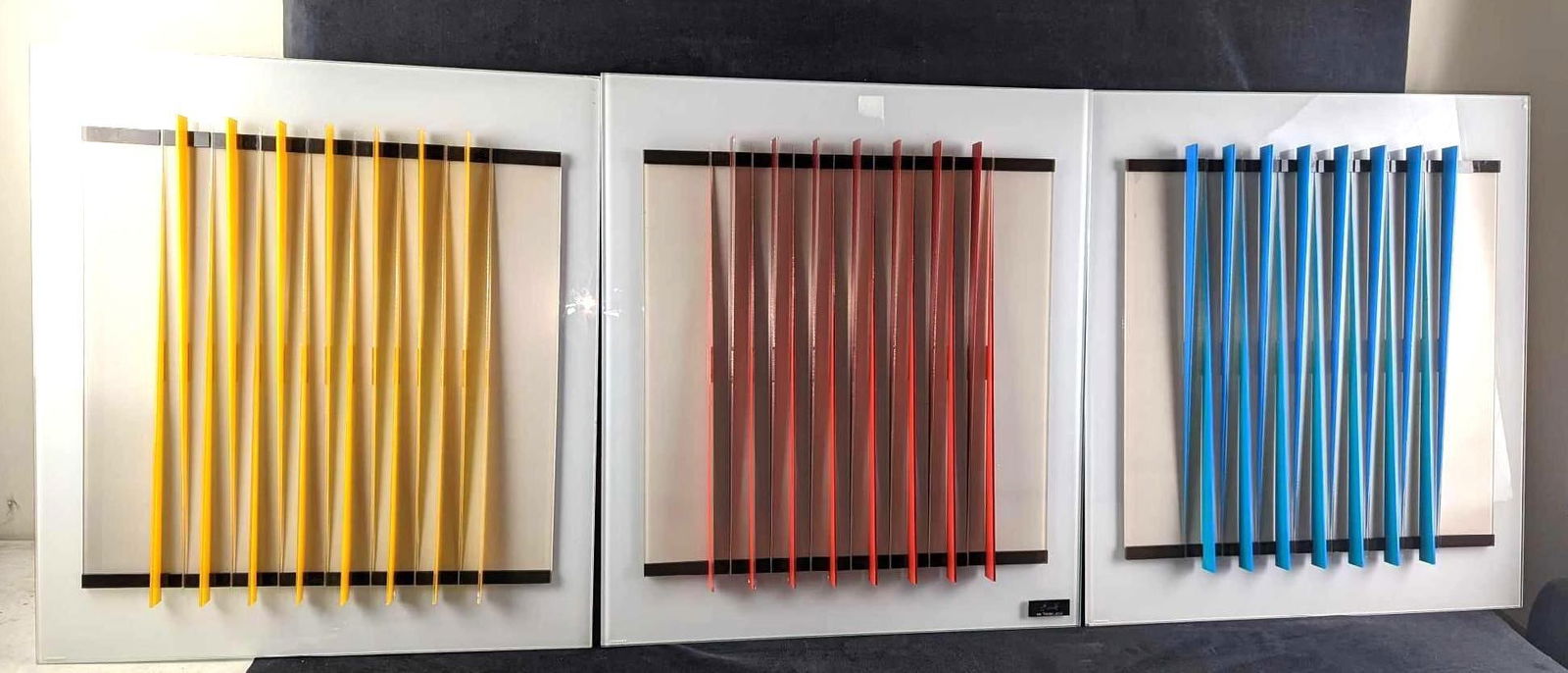 Gustavo Herrera Glass Wall Sculpture My Tricolor: Here is a three-piece mixed media wall sculpture made of glass and acrylic by artist Gustavo Herrera. Each piece is approx 22" x 24" and each piece weighs 11lbs. It also comes with a COA,