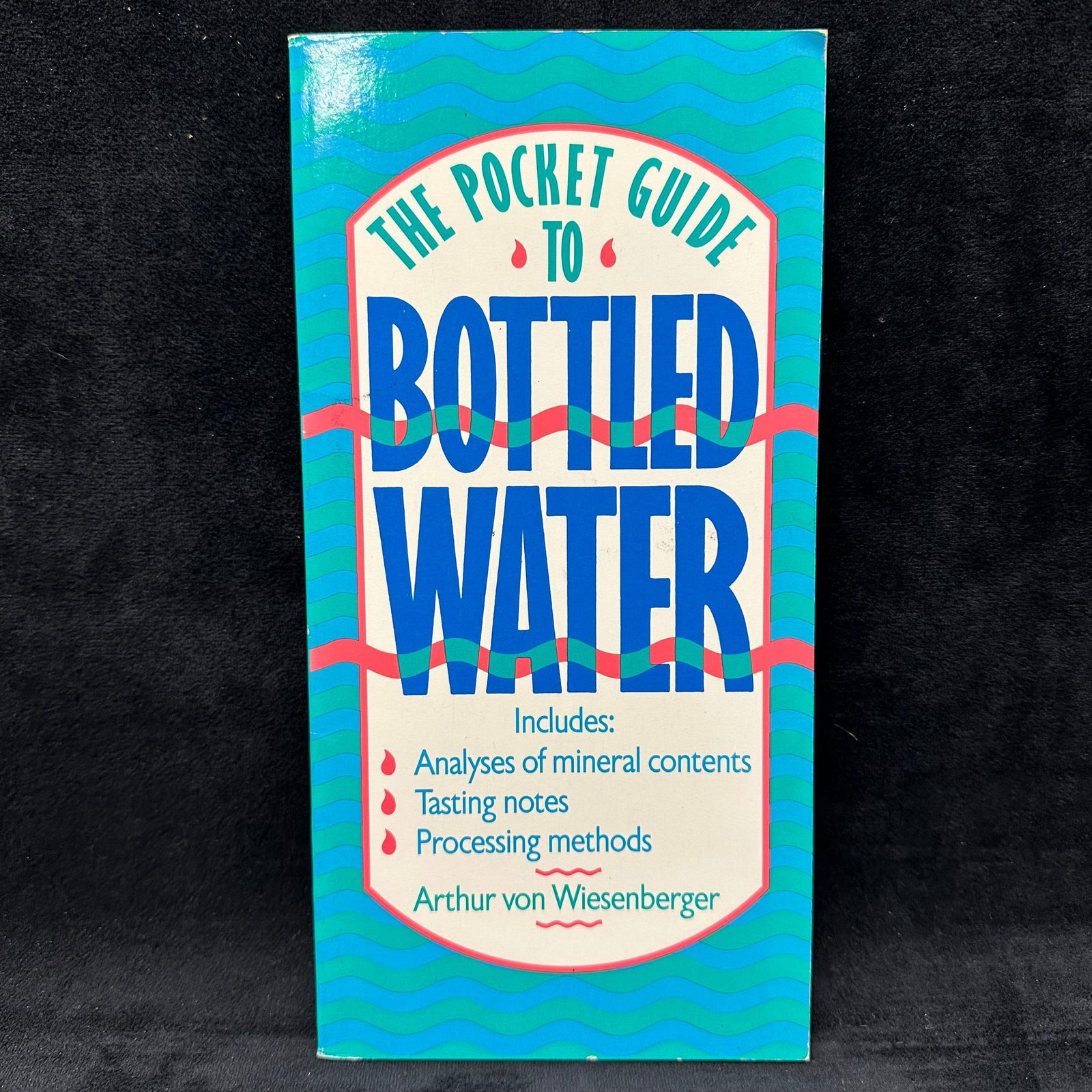 Arthur Von Weisenberger Signed Book The Pocket Guide to Bottled Water Softcover: Signed by Arthur Von Weisenberger with a personal inscription dated 1993 to Michel Roux. Condition shows general handling wear, scuffing, and surface marks to the cover consistent with age. Interior